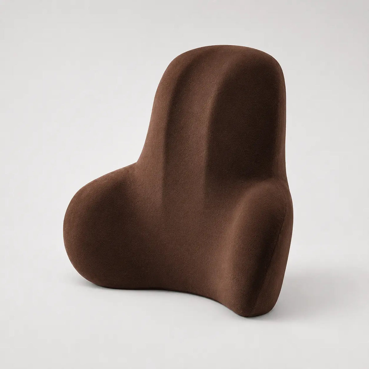 Lumbar support cushion positioned on an office chair
